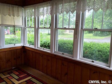 Porch - Enclosed. Very sweet front porch.