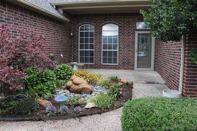 Serene, park-like covered front patio.