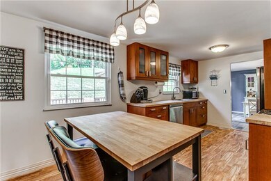 Spacious eat in kitchen with island included