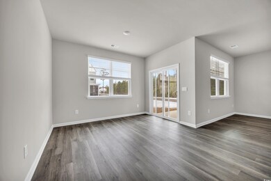 Spare room featuring dark hardwood / wood-style fl