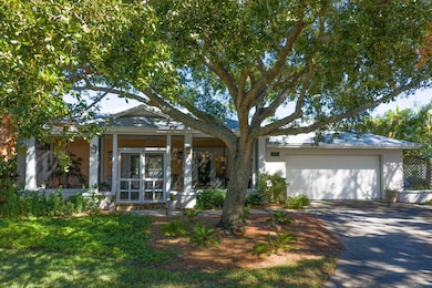 Old Florida Vibes with Impressive Screened Front Porch Entry