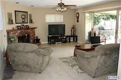 Family room with slider to back yard and patio