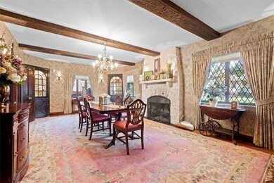 ENORMOUS FORMAL DINING ROOM WITH FIREPLACE.