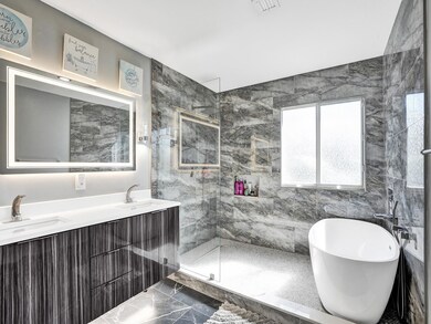 Beautifully upgraded master bathroom with huge-wal