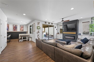 Living area featuring  a large fireplace,  recesse