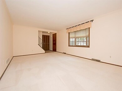 Spacious living room with bay window!  There is ha