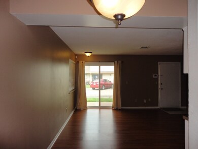 Dining room looking toward sliders in living room.