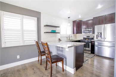 STAINLESS STEEL APPLIANCES AND SHUTTERS THROUGHOUT