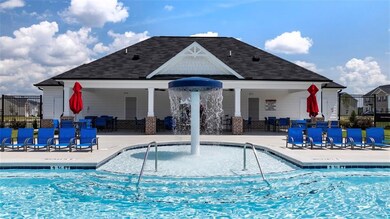 View of swimming pool with pool water feature and 