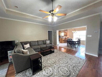 Living room featuring hardwood / wood-style floori