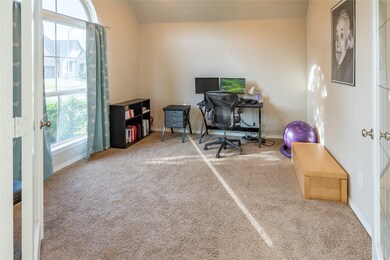 In home office with beautiful French doors & natural light