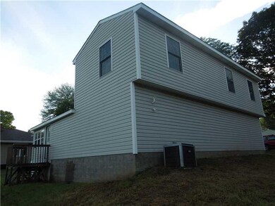 Exterior Back. back--side and newer condenser