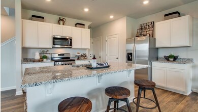 Pictures of another model- The Aisle in Legacy Farms will feature quartz countertops throughout, kitchen backsplash and under cabinet lighting.