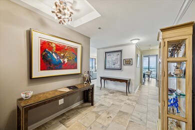 The entryway makes a statement with a striking lig