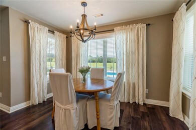Enjoy starting your day here in this cozy spot overlooking the back acreage.
