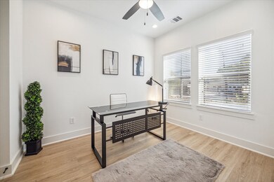 This spacious secondary bedroom features neutral p