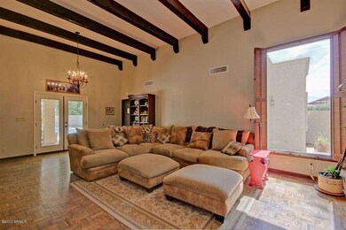Spacious Family Room with Wood Beams