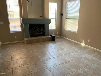 FAMILY ROOM WITH WOOD BURING FP