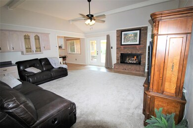 LIVING ROOM: Vaulted ceiling. Beautiful built-in c