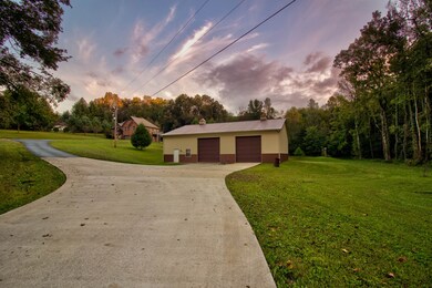 3,000 sqft detached garage / workshop complete with 220v wiring and the lift in the shop will stay for the new owner!