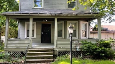 Separate single family home at the back half of property.