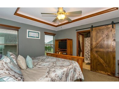 Master bedroom with vaulted ceiling