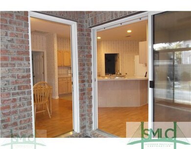 View. Interior View from sunroom into the kitchen 