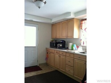 Kitchen. Updated with new cabinets and lighting. D