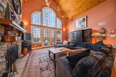 Great room with stacked stone 2 sided/see-through 