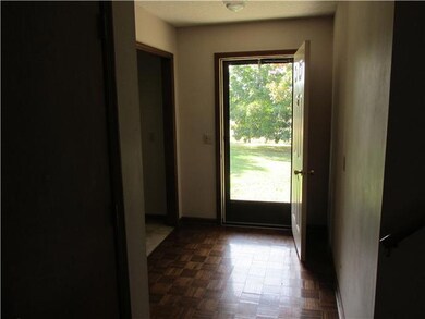 Beautiful Enrty foyer with Closet and Parque wood flooring!
