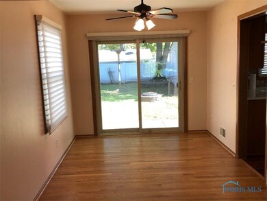 DINING AREA EXTENDS FROM LIVINGROOM AREA. HARWOOD