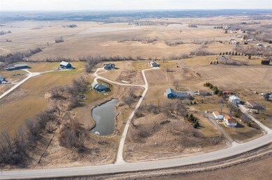32nd Ave is at the Bottom of the Photo.  Lot is on