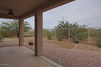 Covered patio out to view fence