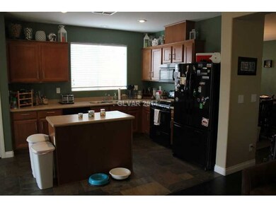 Property Photo. Kitchen with Island and pantry