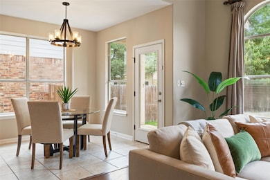 Dining space featuring an inviting chandelier and