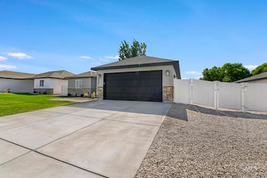 View of front of property featuring a gate, and RV Parking.