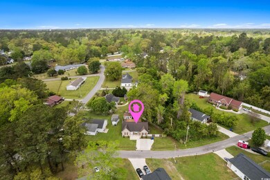Drone / aerial view featuring a view of trees