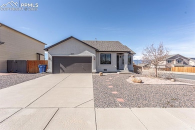 View of front of house featuring fence, stucco sid