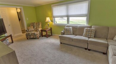 The main floor is beautifully updated with crown m