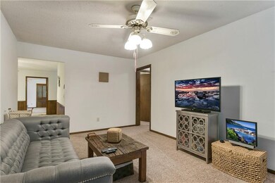 Living room.  On the left is the dining area and d