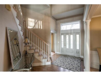 Entry way with door to den/study.