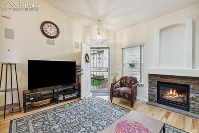 Step into the spacious living room highlighted by soaring ceilings, beautiful gas fireplace and warm hardwood floors.