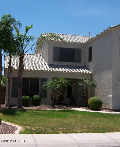 Inviting Entry with Palm Trees