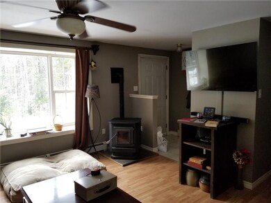 Living Room. Pellet stove. Front entry.