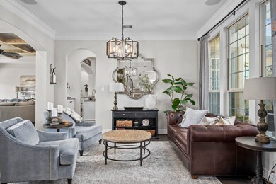 Just off of the entrance is the formal living area overlooking the courtyard.