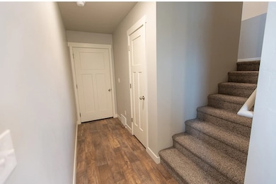 hallway from living room to garage/upstairs