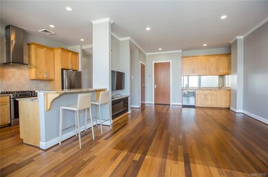 Great room looking towards the kitchen and wet bar