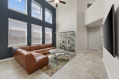 Navy accent wall in the Living Room draws your eye