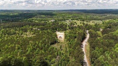 Aerial view of property and surrounding area featu