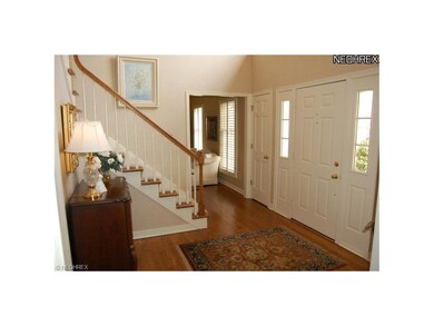 Gracious 2-Story Foyer with Turned Staircase and H